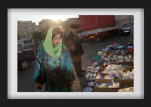 She looks for cheap items sold on the street near the railroad. 26.12.2014