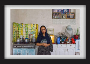 Hanieh standing in her father’s house speaking to her mother. Before marrying Bahram, she was going to marry a boy that her family knew from their village. However, after a while he got married to another girl. Because of this, Hanieh said yes to the first man that proposed—Bahram, who lived in Tehran—in order to get far away from the man and his wife. She says that some time after she got pregnant, she found out about her disease. She has attempted suicide several times. On her last attempt, she used pills and was hospitalized. She says she does not take her medicine at the moment and adds that life does not matter to her. 14.09.2017