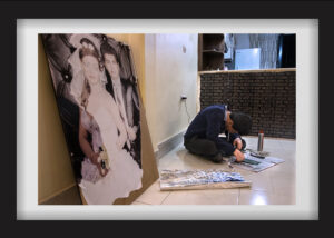 Bahram after using drugs; there is a picture of their wedding that has been torn apart by Hanieh. A short while after the divorce, the philanthropist who rented the house, with the owner's agreement, asked for the apartment to be emptied. Since then, Bahram has been spending most of his time outside or in drug rehabilitation camps. Currently, he is living with his parents, and he is in contact with Baran through the phone. He has not heard from Hanieh. 01.11.2017